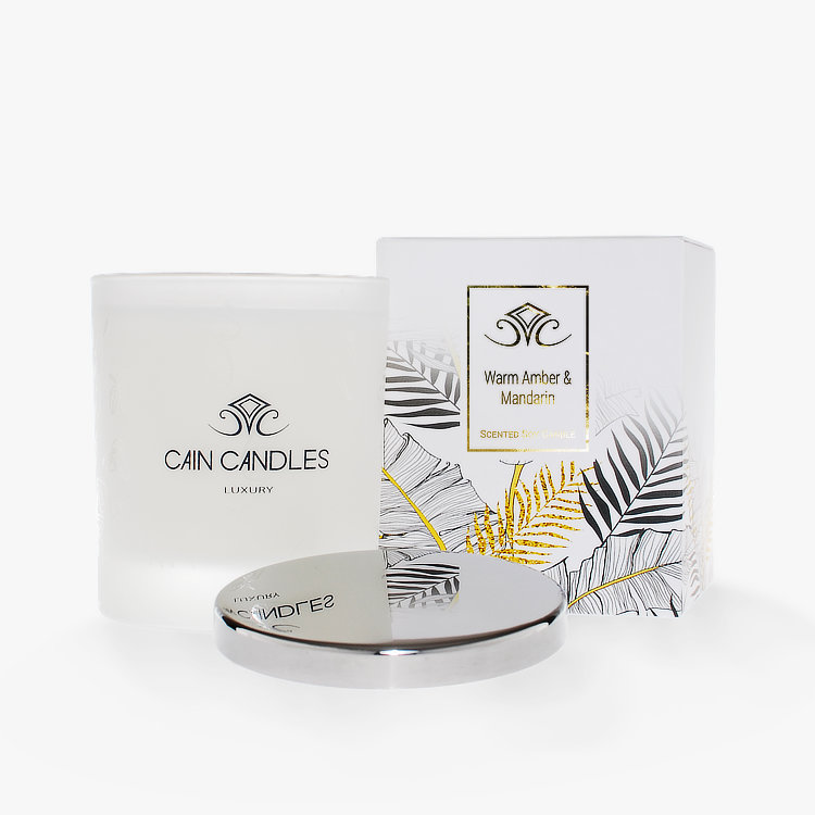 luxury single wick candle with polished stainless steel lid and gorgeous gold foiled leaf design presentation packaging